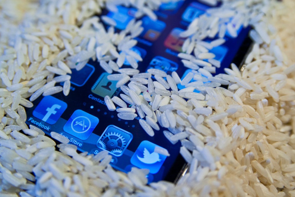 white rice drying phone while camping