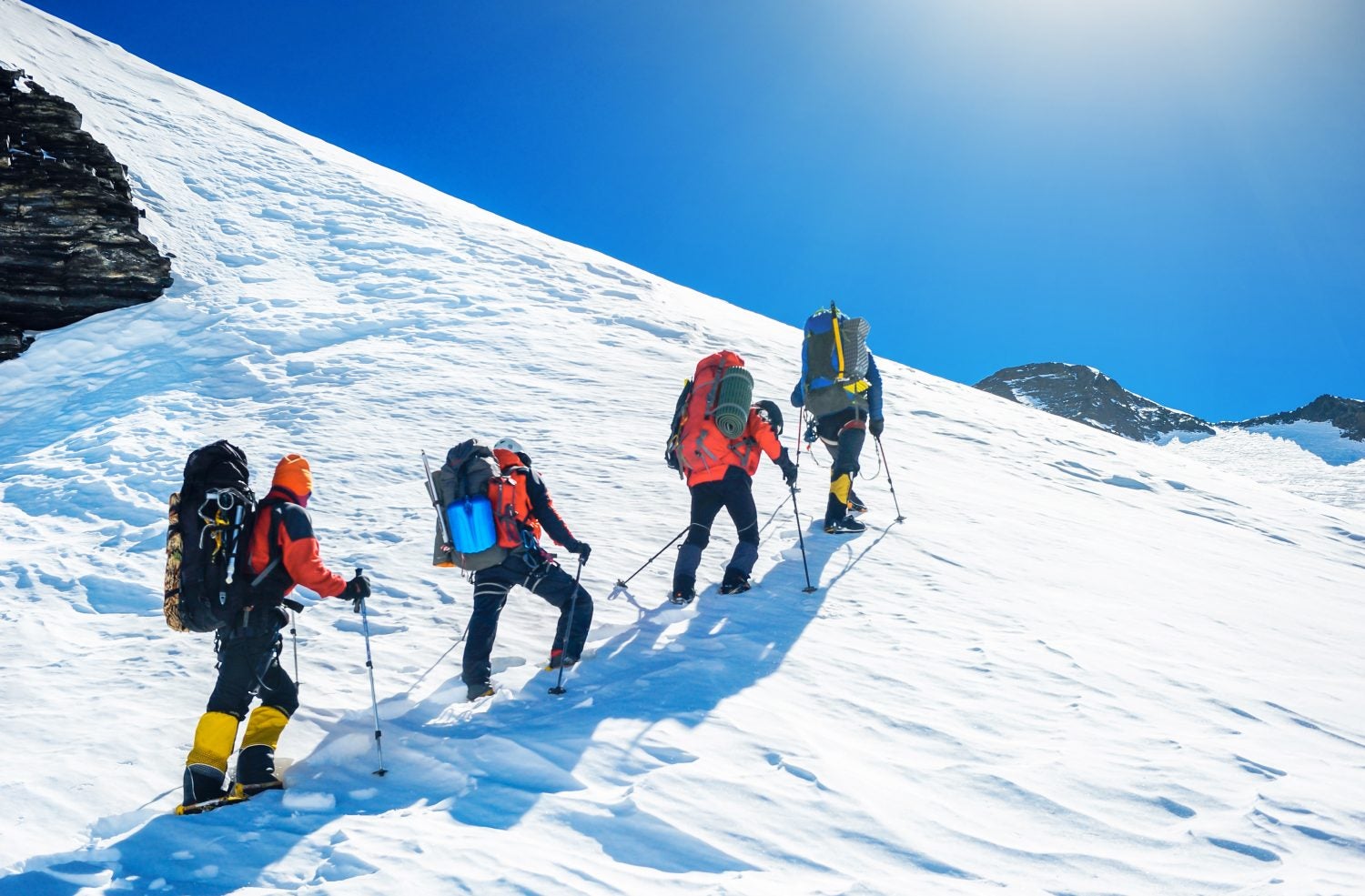 mountaineering through the snow