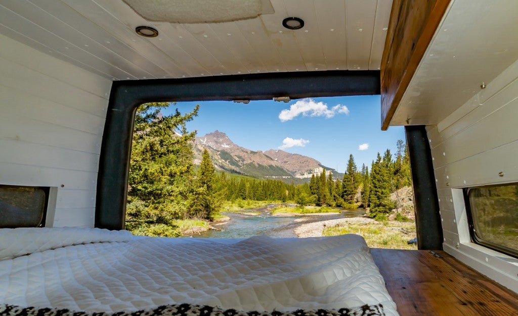 a campervan looking out to the outdoors