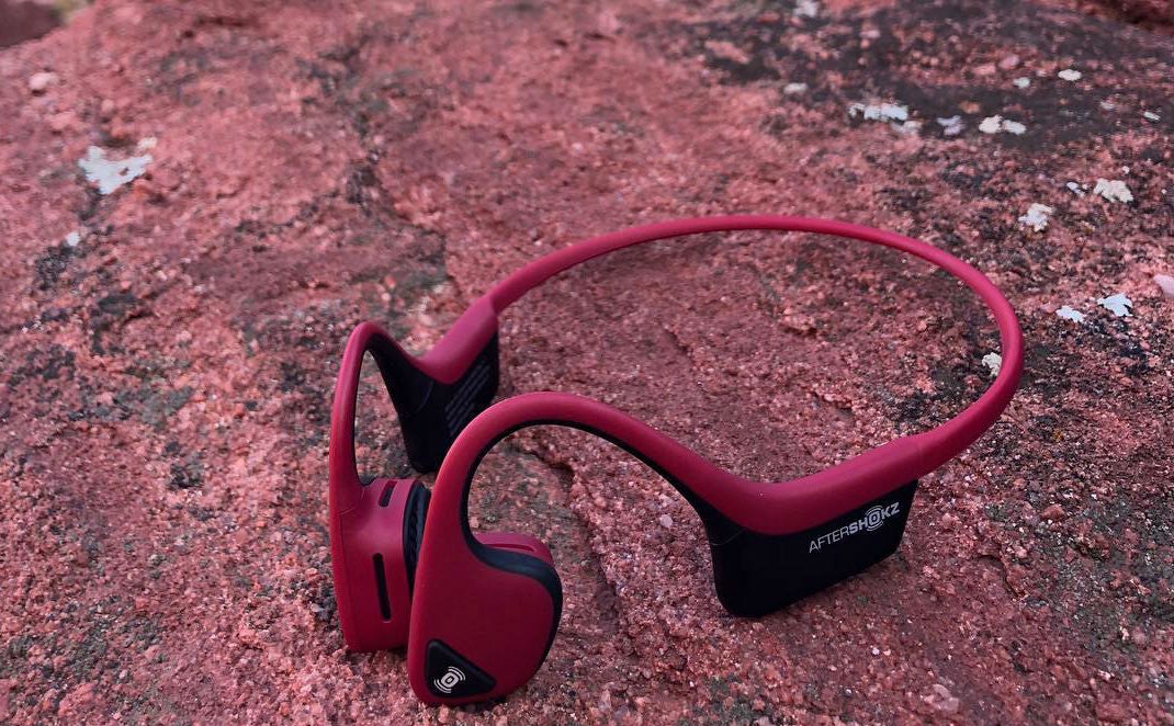 red headphones from aftershokz