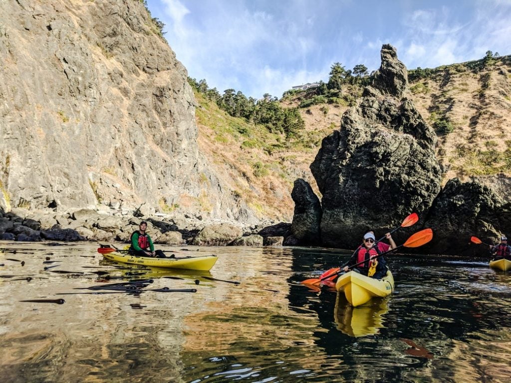 kayakers paddling at eco-resort at Cape Blanco State Park