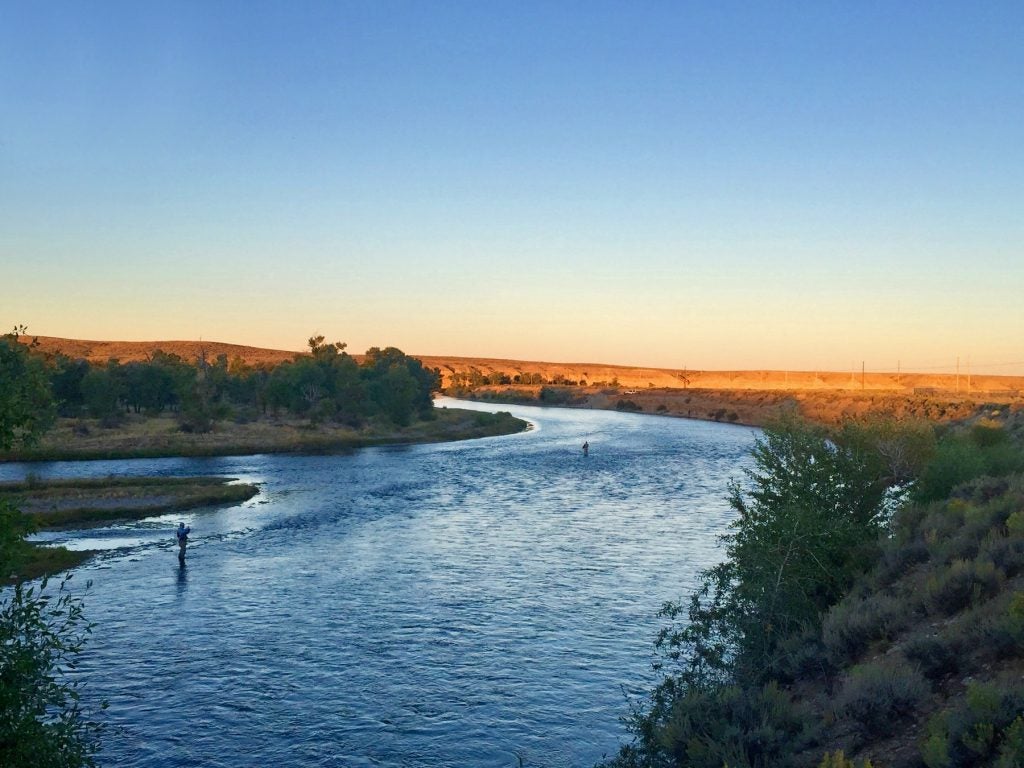 a river on an open prairie visible from a free campsite in wyoming