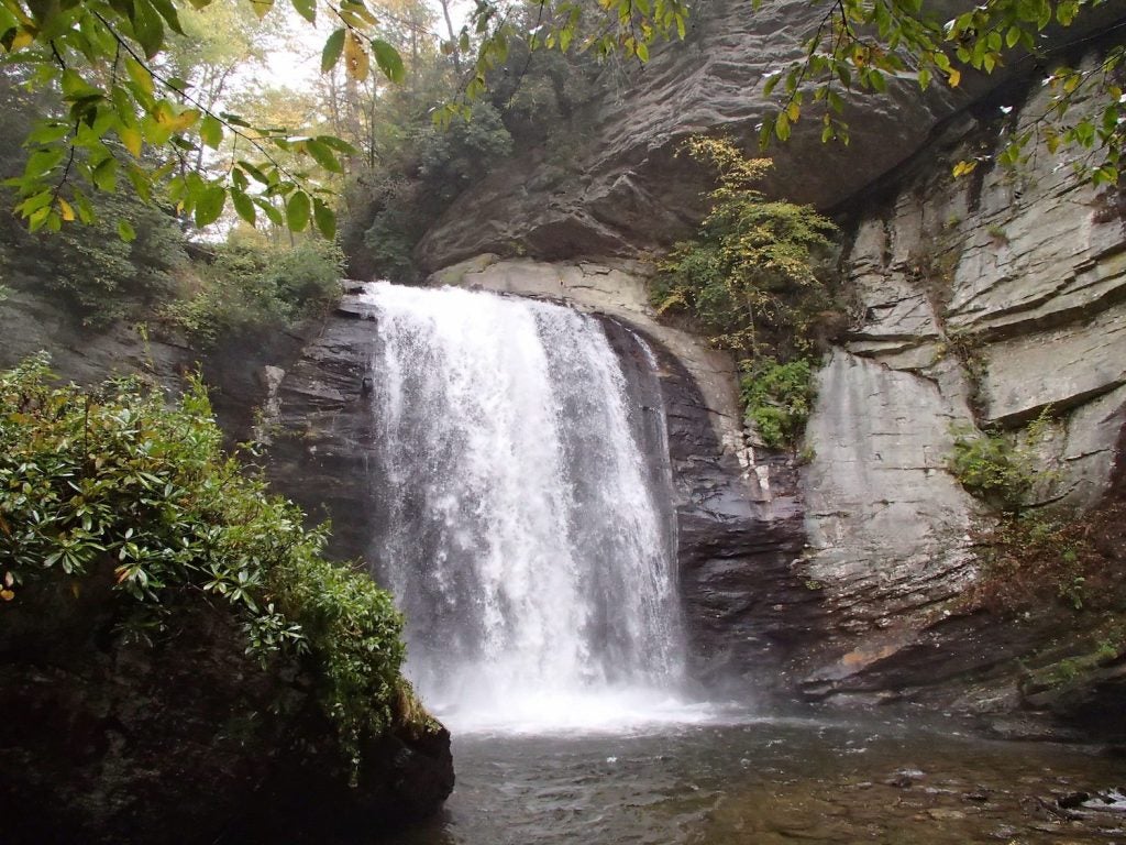 a waterfall flows on the Davidson river which runs through the campground