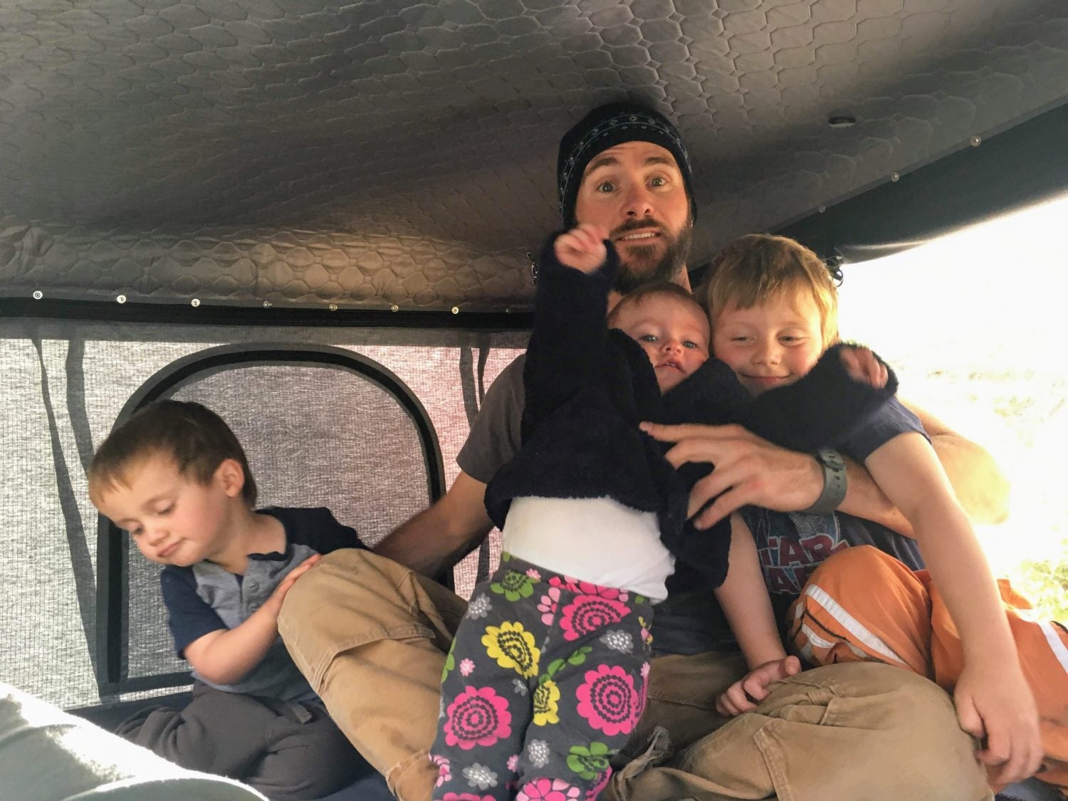 Fitting a dad and three kids in the Roofnest hard shell rooftop tent 