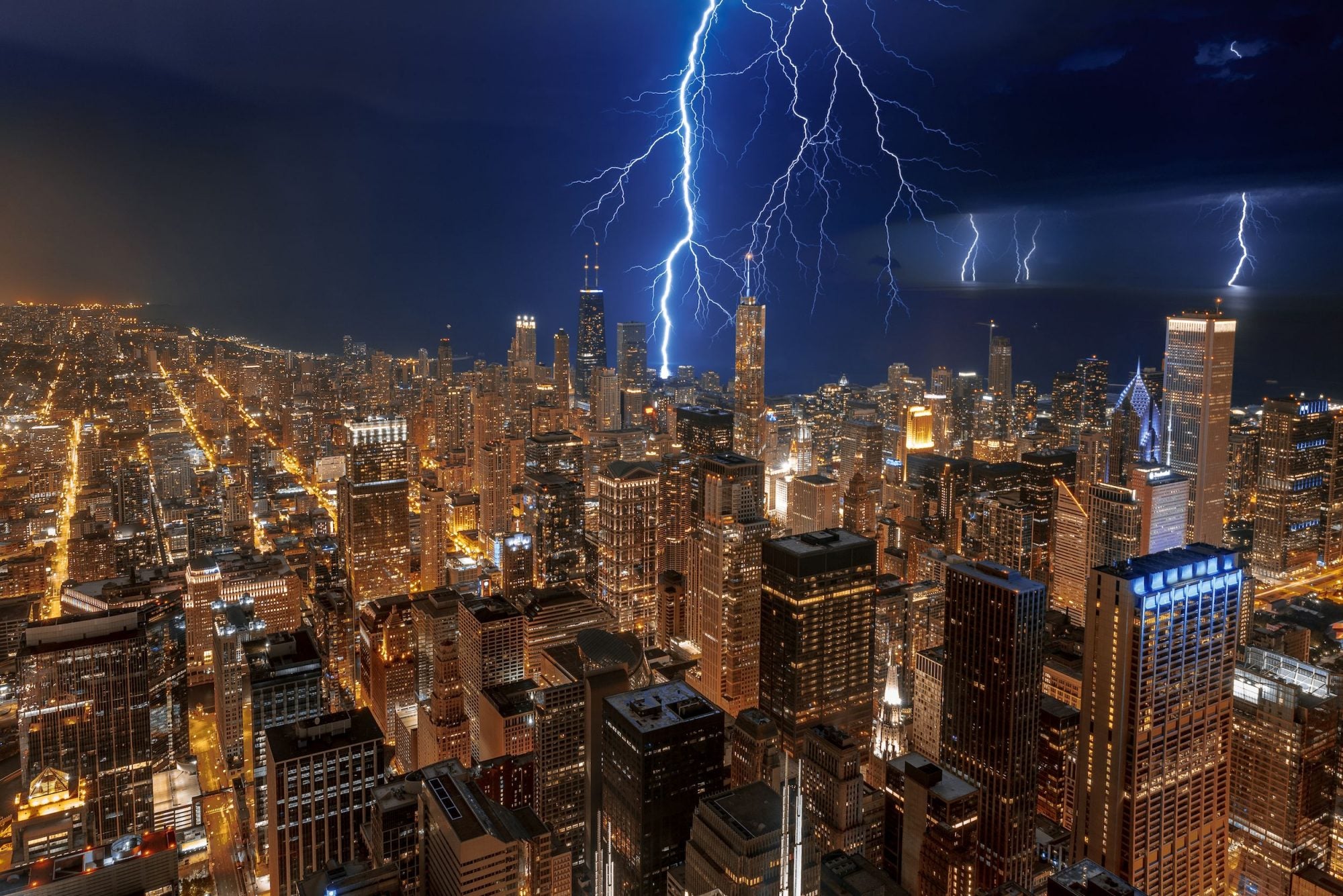 lightning strikes chicago skyline at night