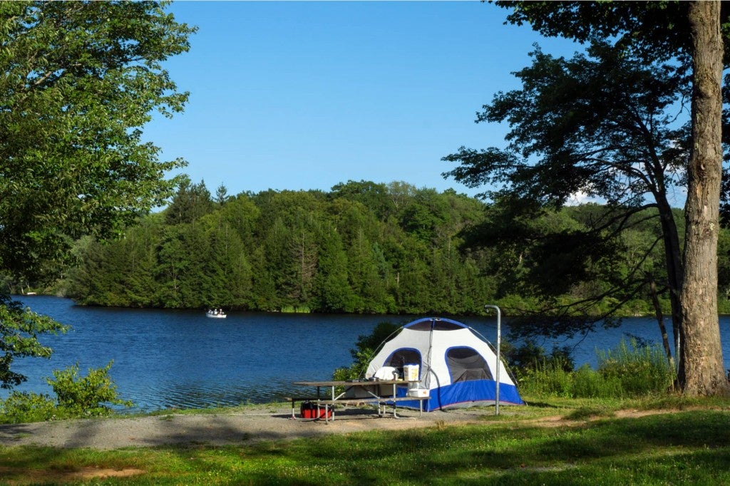a tent near a river campgrounds in pennsylvania