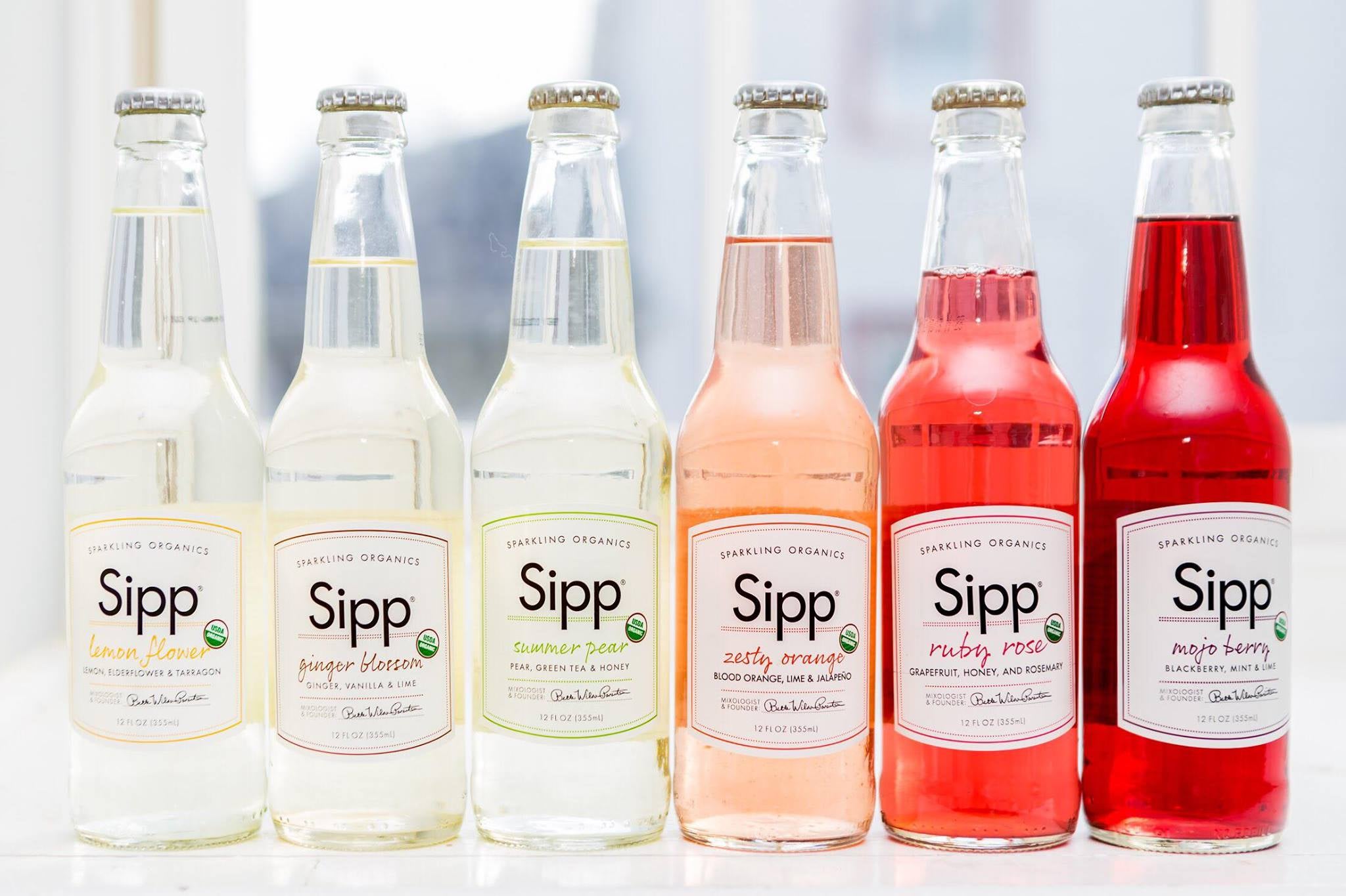 6 bottles containing various sipp beverage flavors