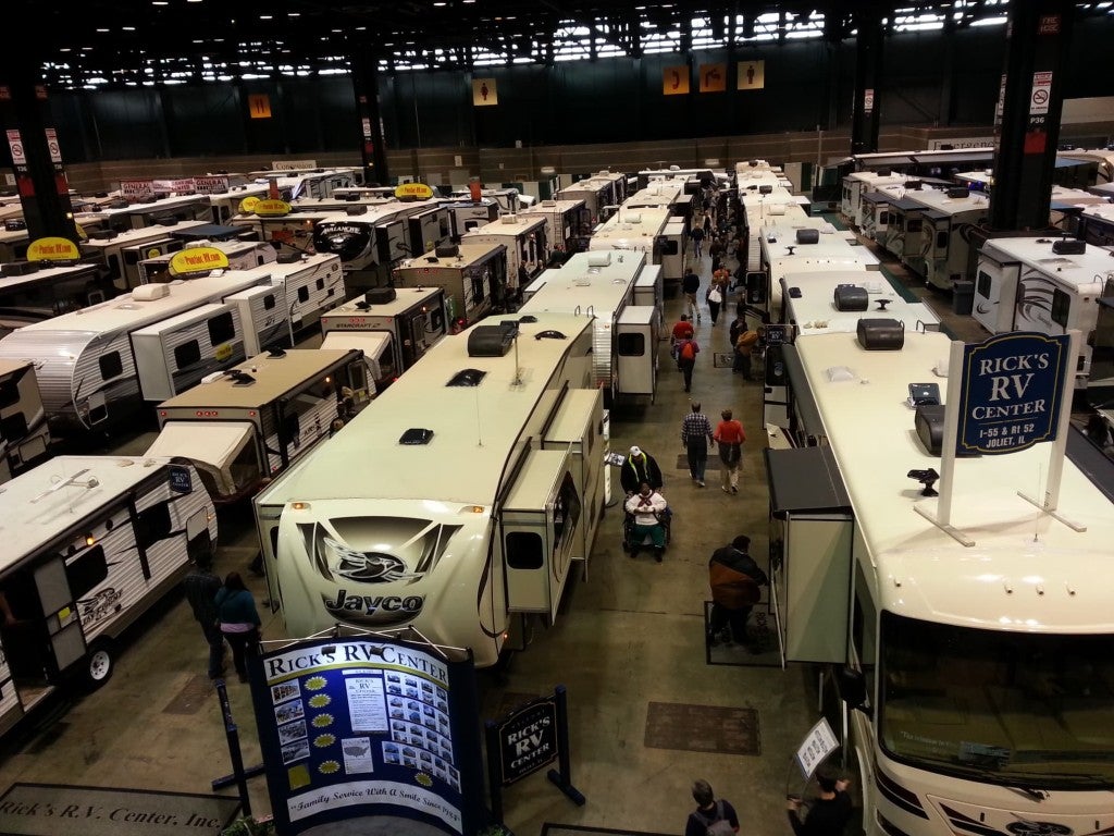 RVs lined up for sale at a trade show