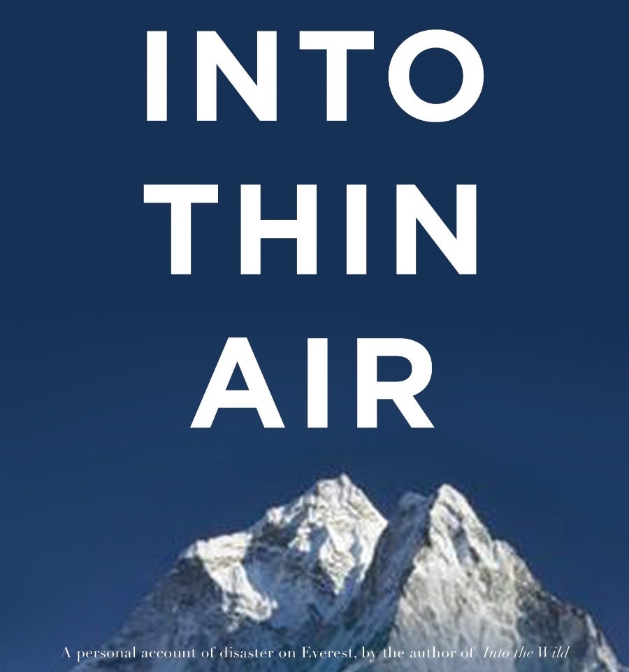 into thin air book cover with dark sky and mountain