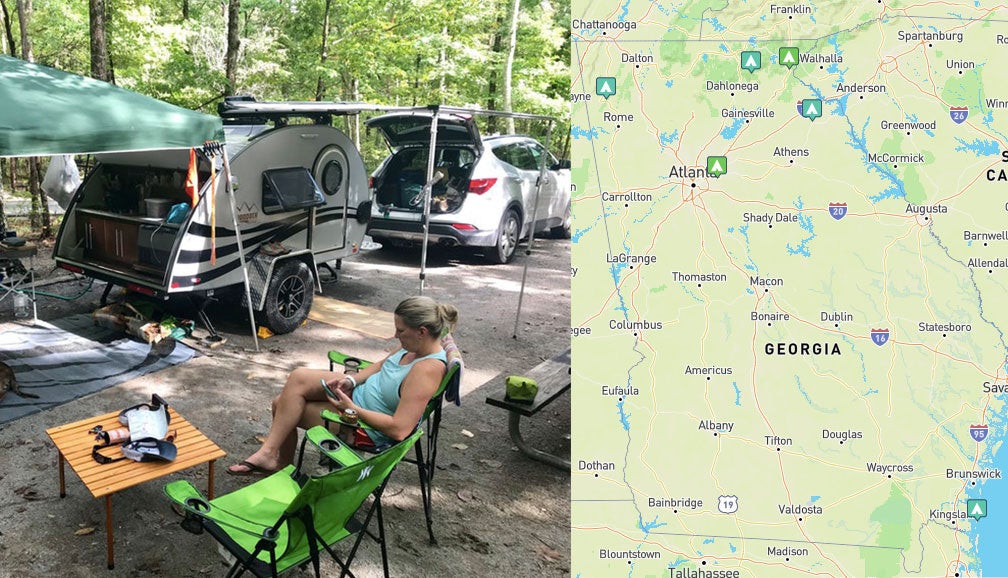 view of a campsite occupied by a small camper, beside a map of georgia campgrounds
