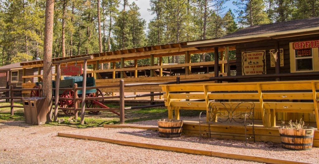 the old wooden blue bell stables in custer state park