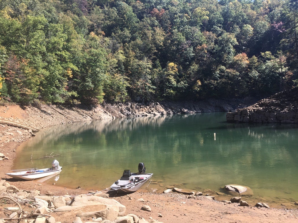 two boats docked on the shore of a river in North carolina