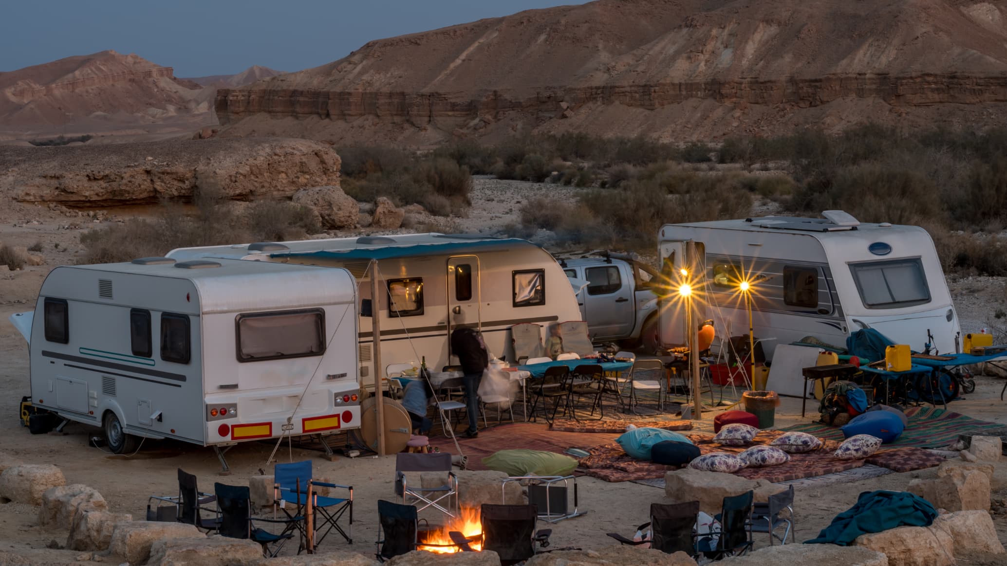 RVs circled at a group campground in the desert