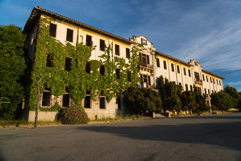 A three story building covered in ivy on Angel Island