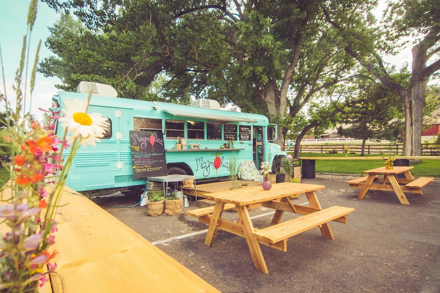 Magnolia's teal bus converted into a food truck.