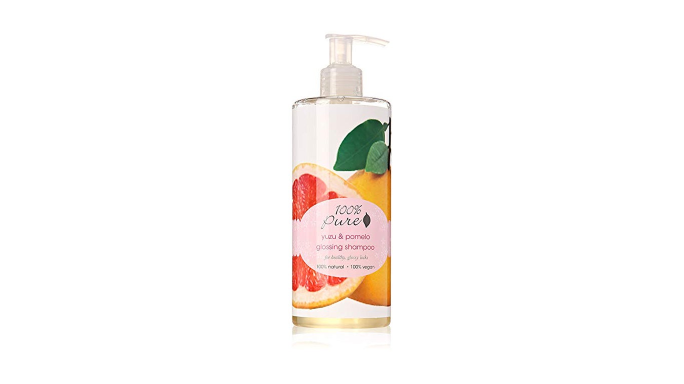 Pink and orange bottle of 100% Pure Yuzu & Pomelo Glossing Shampoo