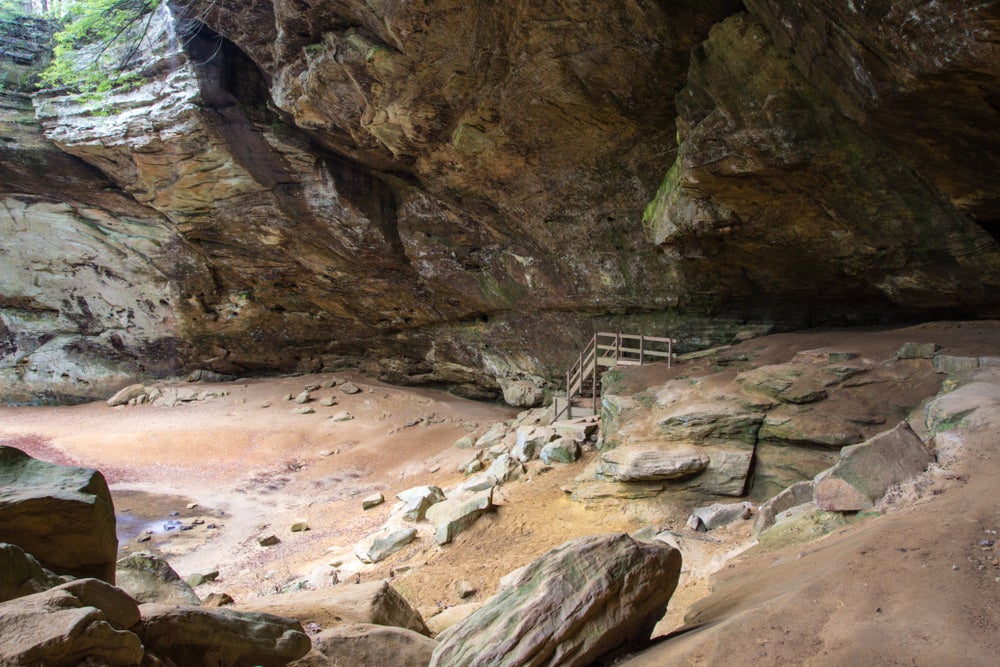 Wooden stairwell with the Ash Cave rock formation.