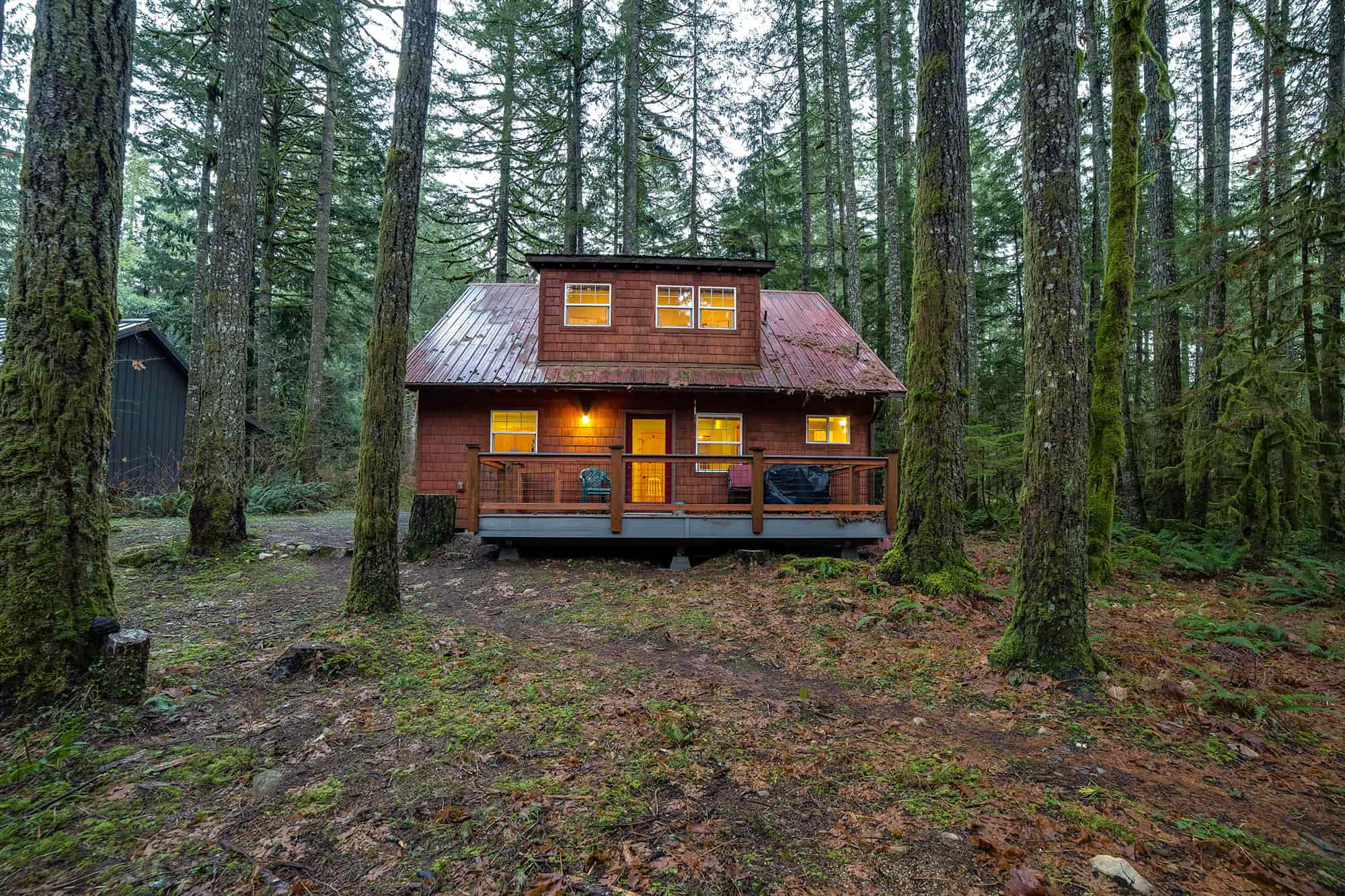 a cozy cabin surrounded by trees on mt. baker