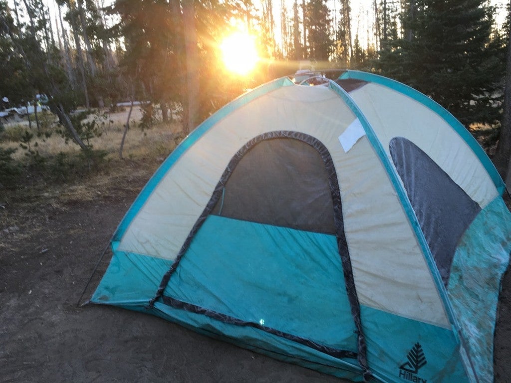 a tent during a sunrise at a campground near crater lake