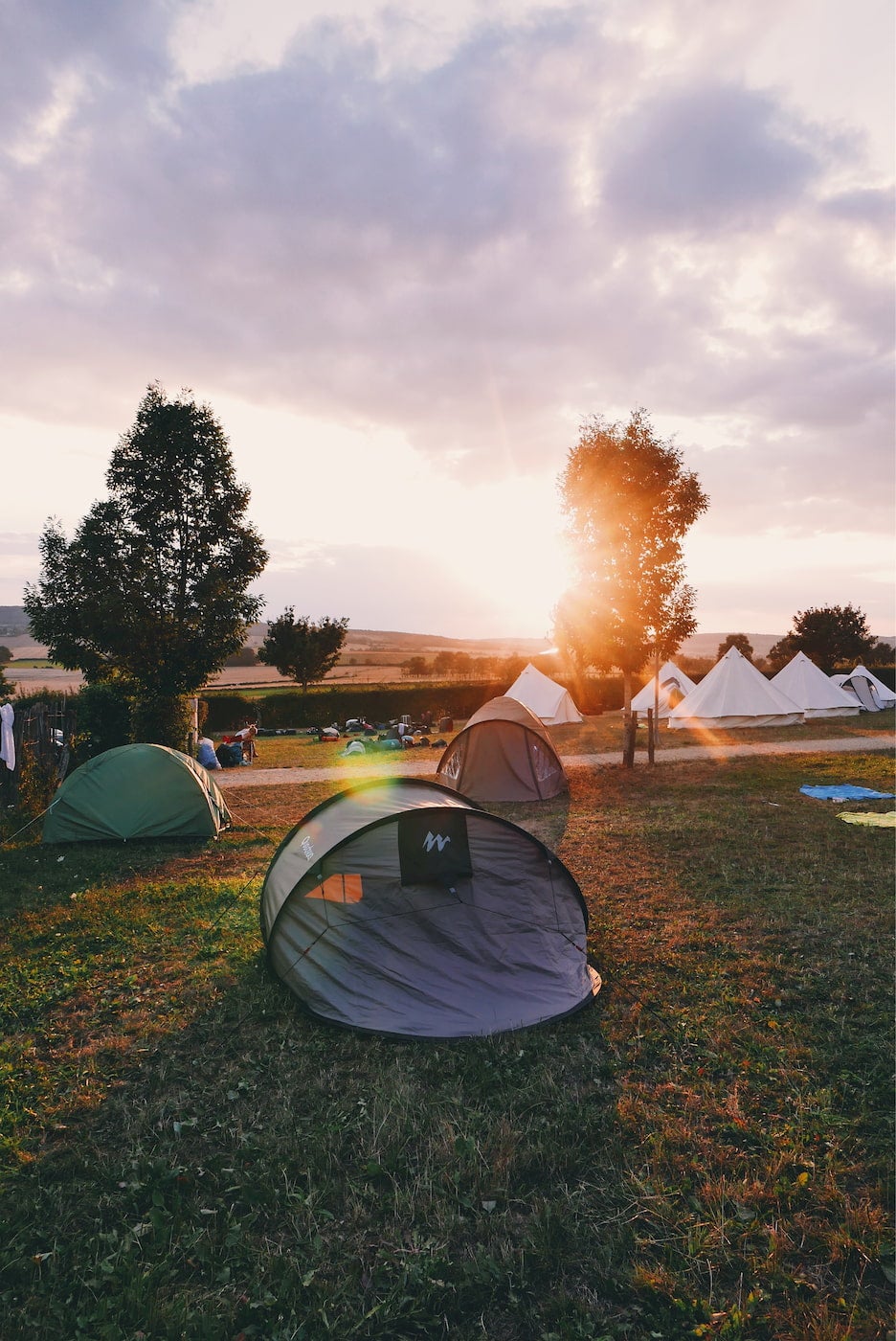 Festival campsite in a field.
