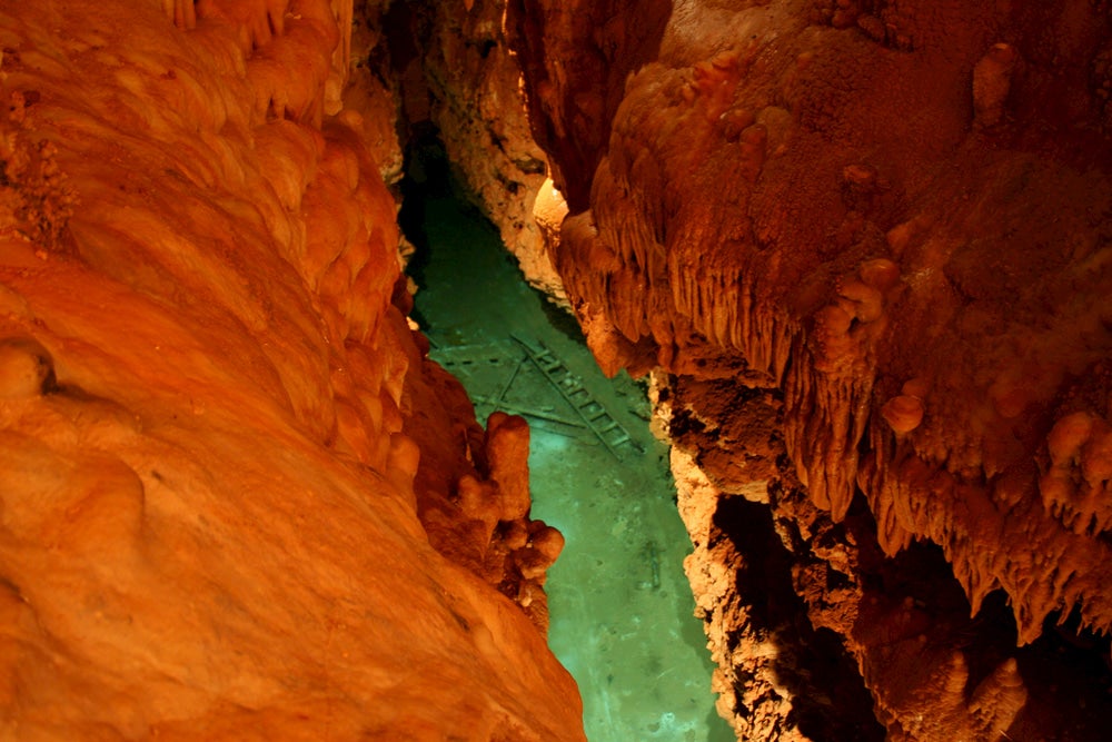 Bridal Cave stalactites with cave lake below.