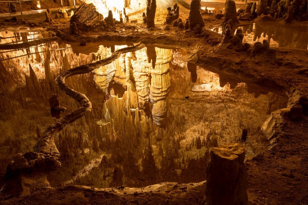 Onondoga Cave lit up with stalagmites in Onondoga Cave State Park.