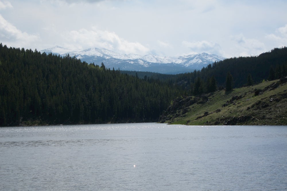 Panoramic view of lake with mountains in background 