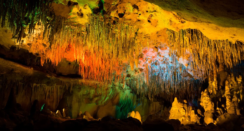 multicolored lights projecting on the ceiling of a cave in florida state parks