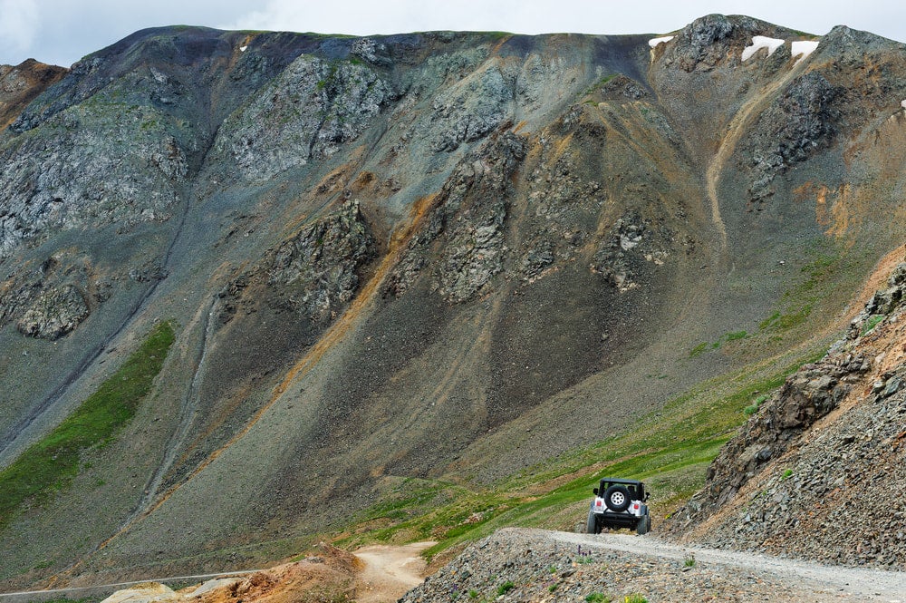 a car driving along a highway in colorado