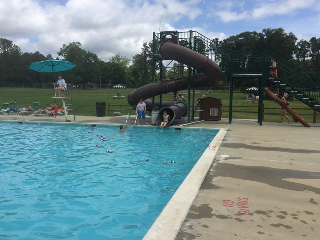 a waterslide leading to a pool in a virginia state park