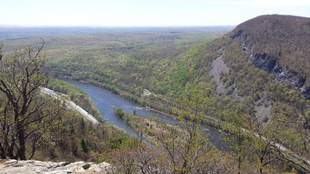 an overlook on the delaware river in pennsylvania from a high mountain