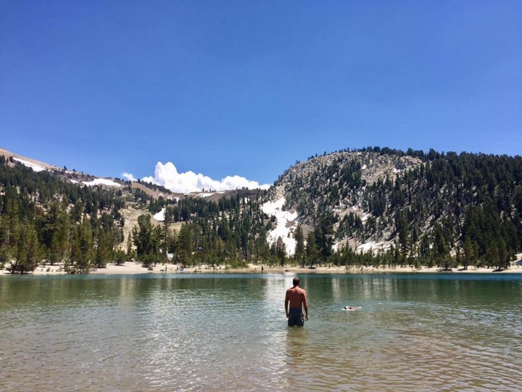 a man swimming in a hot spring in california