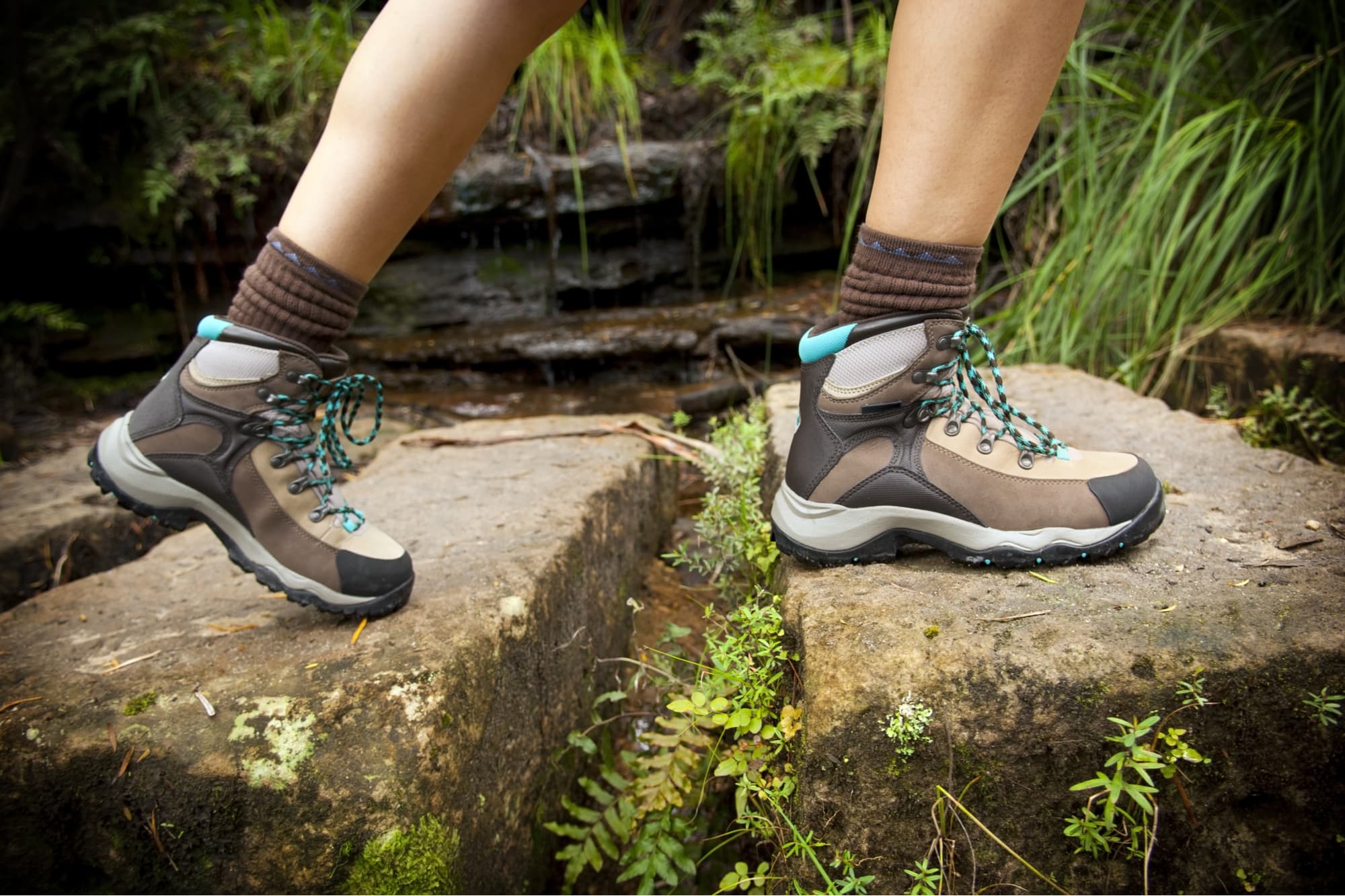 hiker wearing a pair of boots on a hiking trail