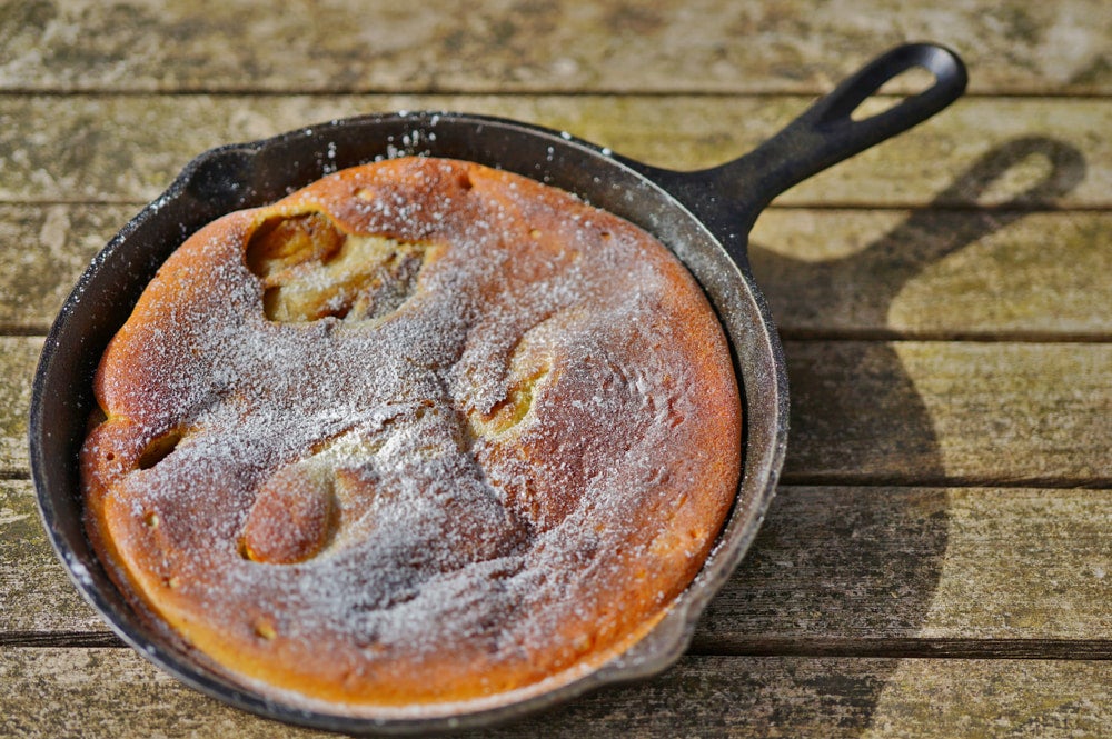 a dutch baby in a cast iron pan
