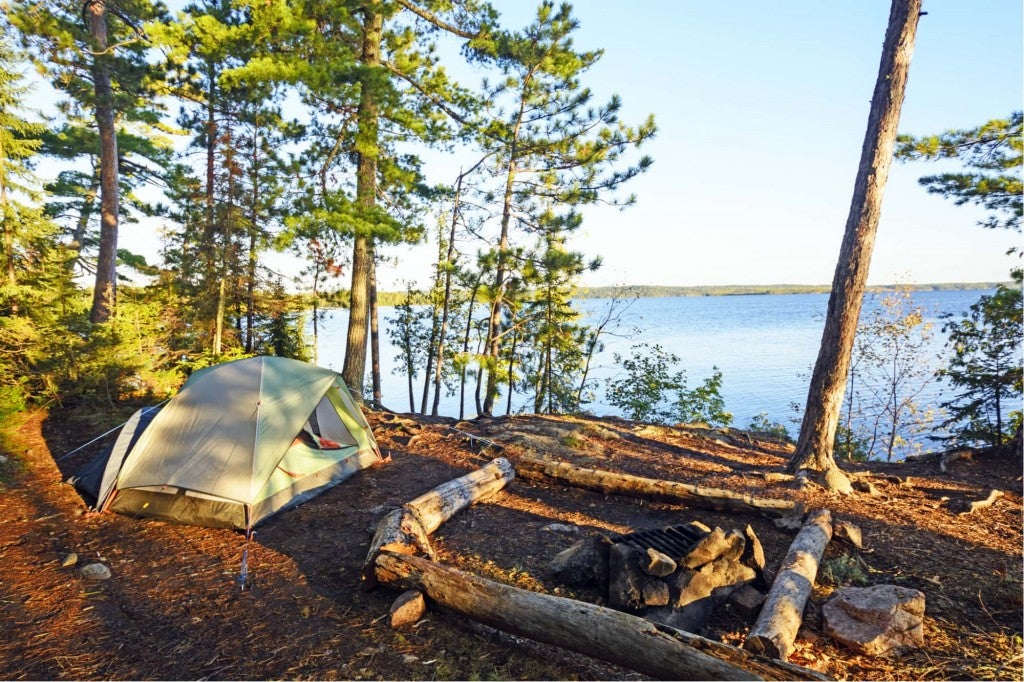 a beach campground set up near a lake in minnesota