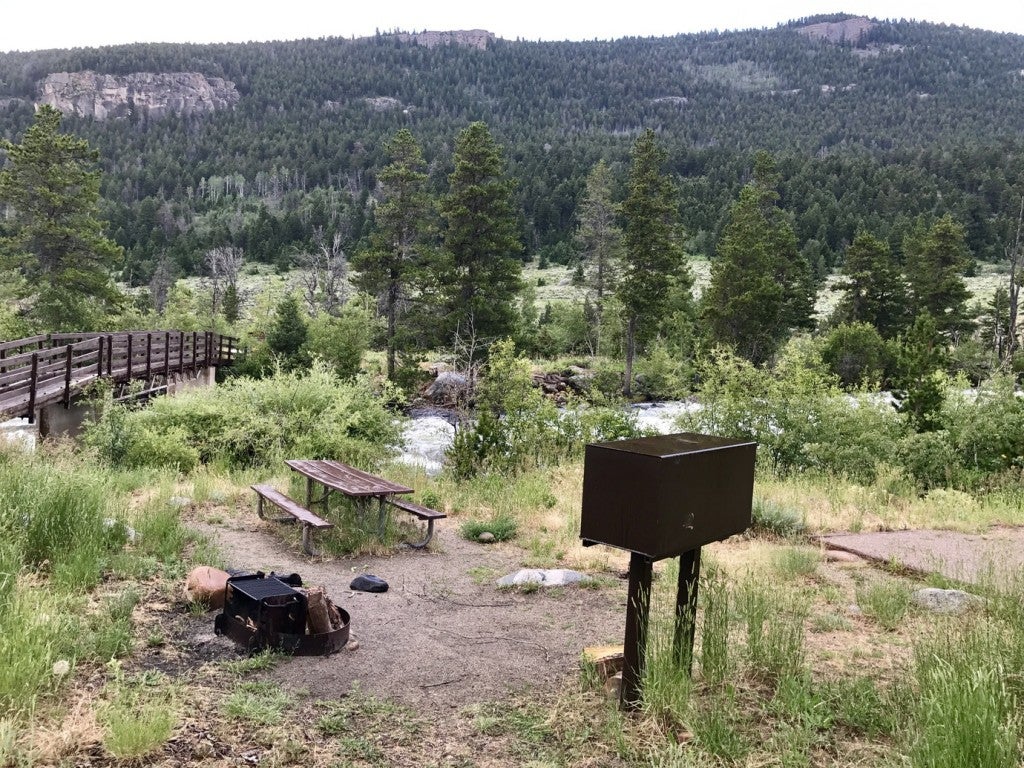 a campsite near a river in backcountry woming