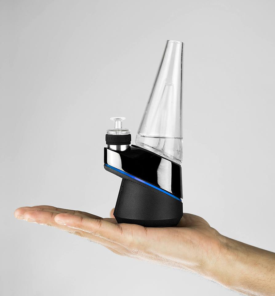 a hand holding a futuristic bong