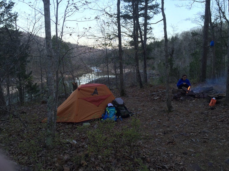 orange tent set up in woods at Missouri's Johnsons Shut Ins State Park, photo from a camper on The Dyrt