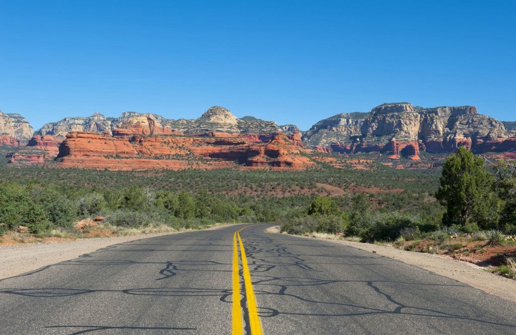 Road leading to red rock formations