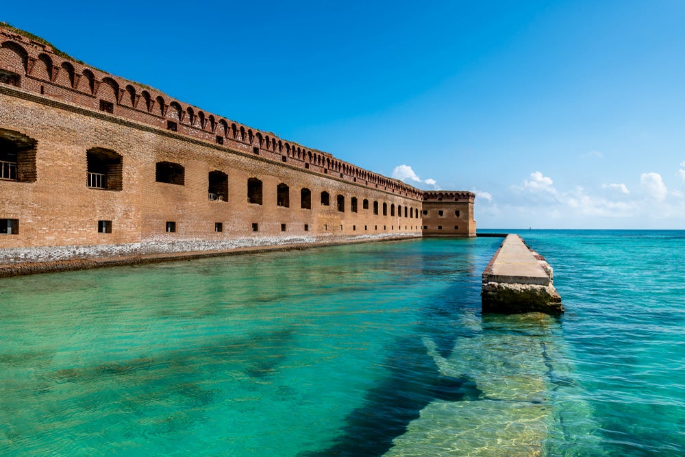 Dry Tortugas National Park with blue water and building 