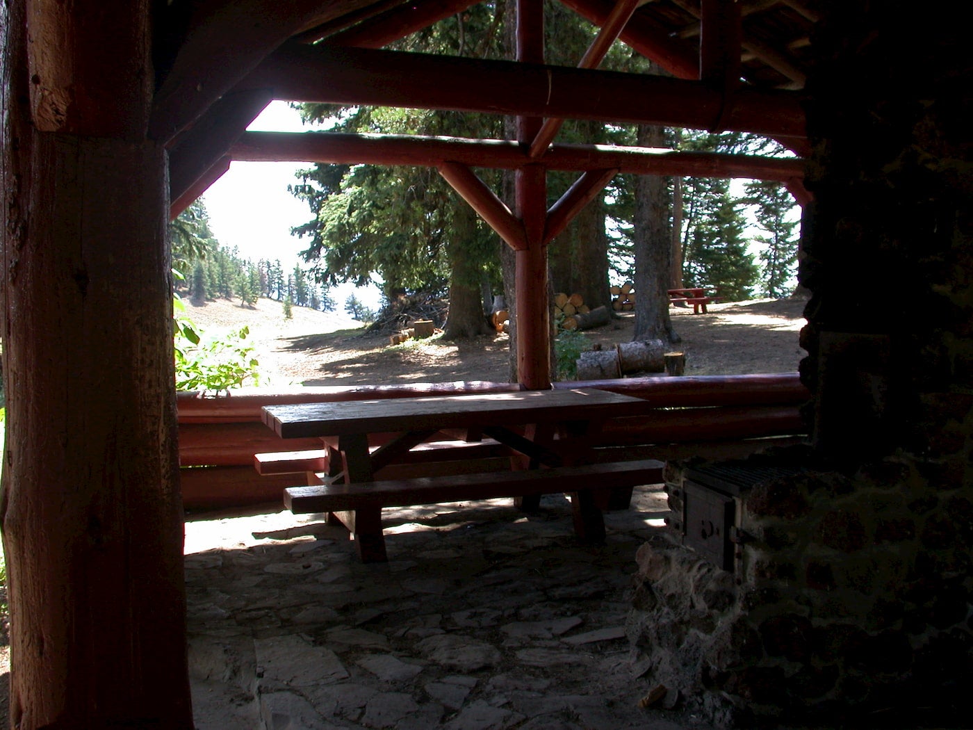 Picnic table and stone structure at Godman Campground.
