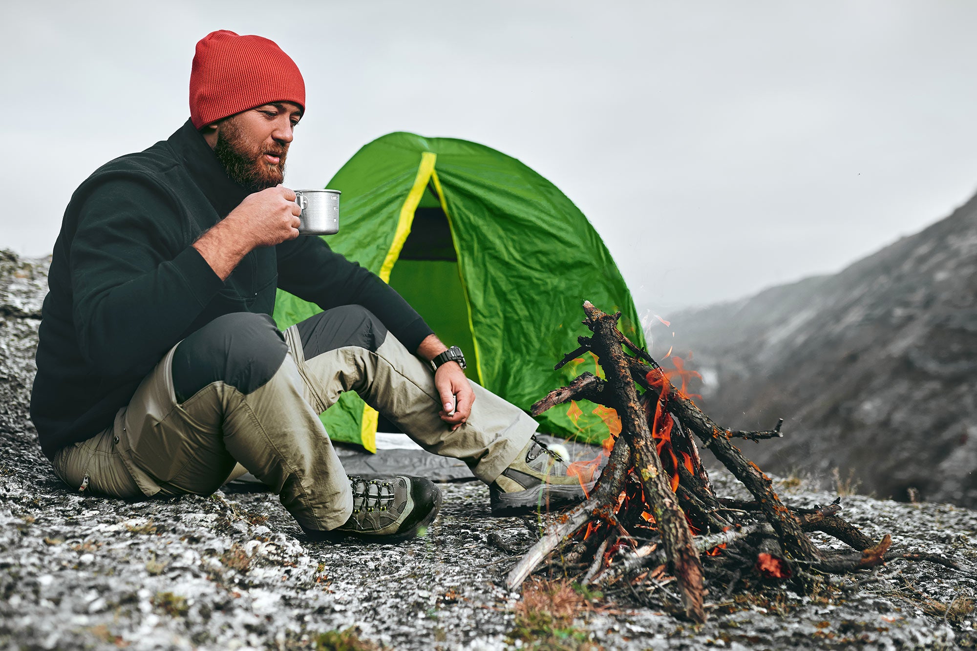 man camping in wilderness