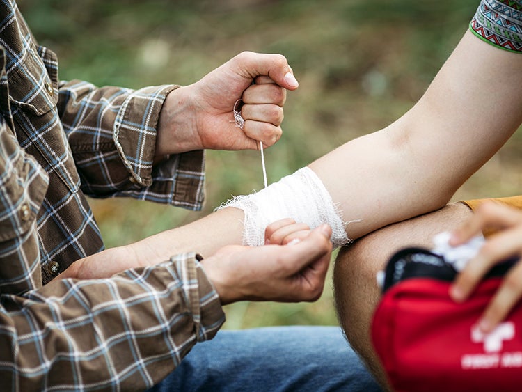 first aid bandaging arm