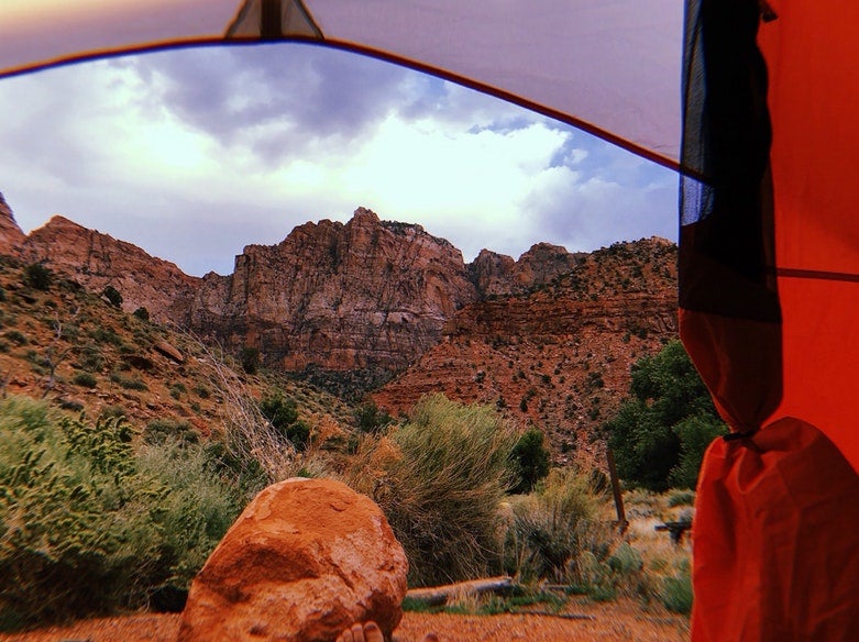 view from inside tent of red rocks at Utah's Watchman campground, photo from a camper on The Dyrt