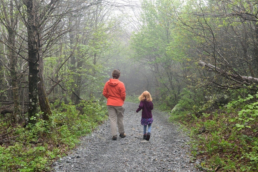 mother and daughter walk down foggy gravel path in Virginia's Big Meadows, photo from a camper on The Dyrt