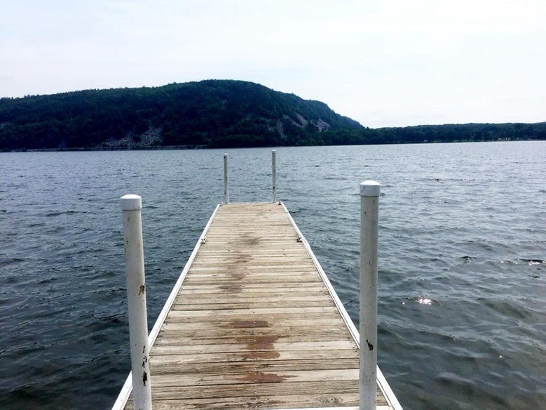 dock leading out to waters of Wisconsin's Devils Lake, photo from a camper on The Dyrt