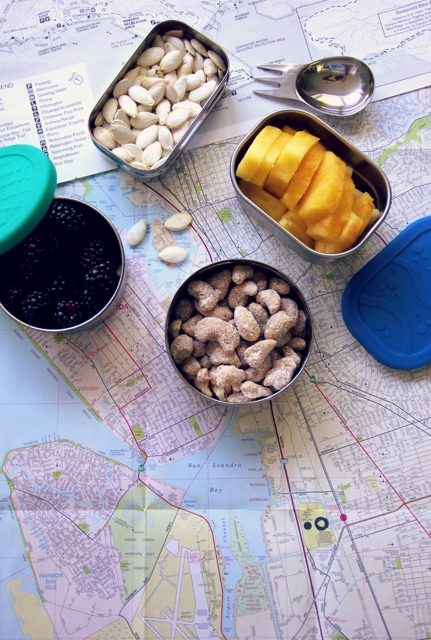 Healthy snacks laid out on a map.