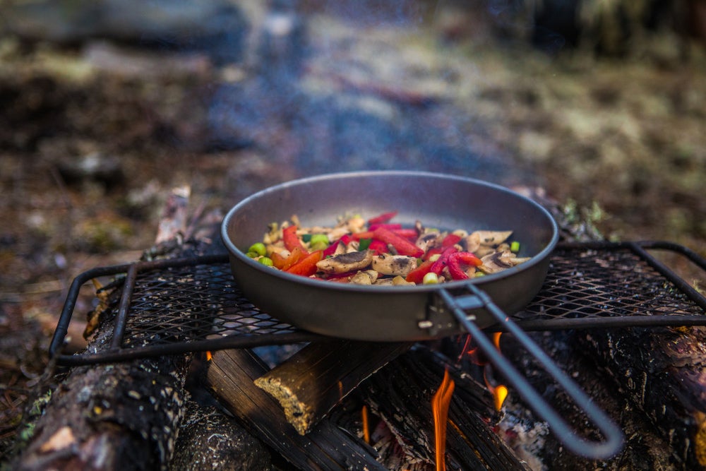 Stir fry in a pan on grill