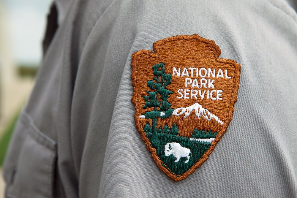 National park ranger's badge on shirt sleeve