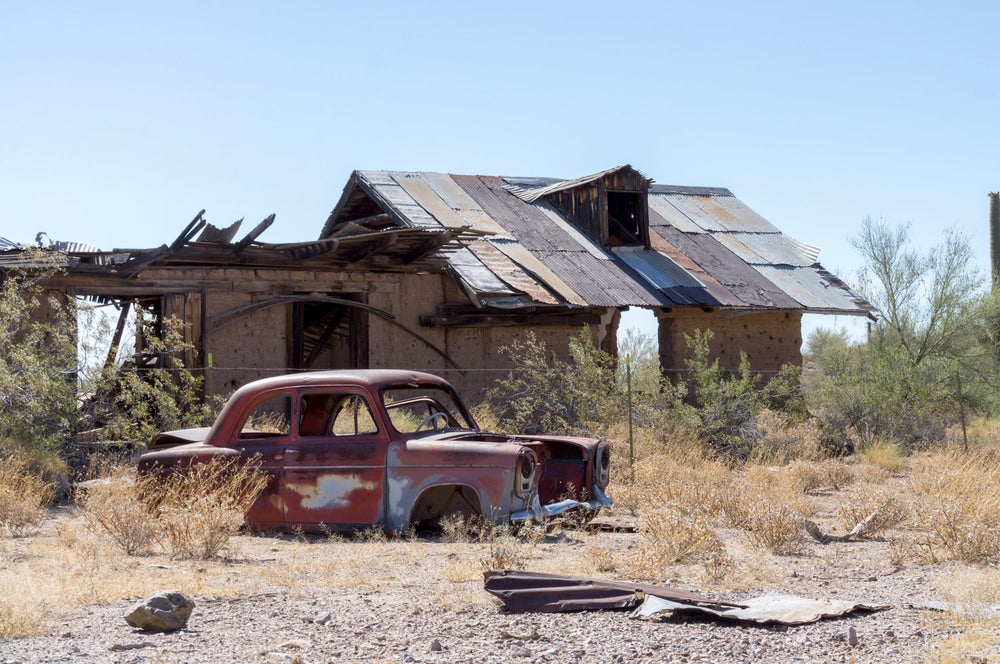 Old car and abandoned building in Vulture City, Arizona 